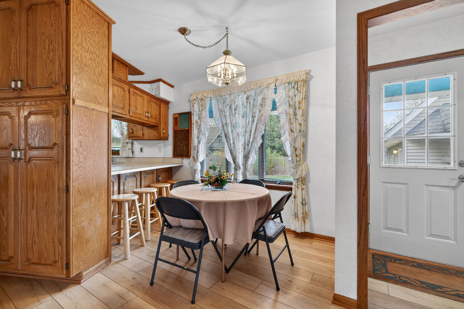 3420 Quail Court Morris, IL 60450 - Photo 6 of 53 a view of a dining room with furniture window and wooden floor