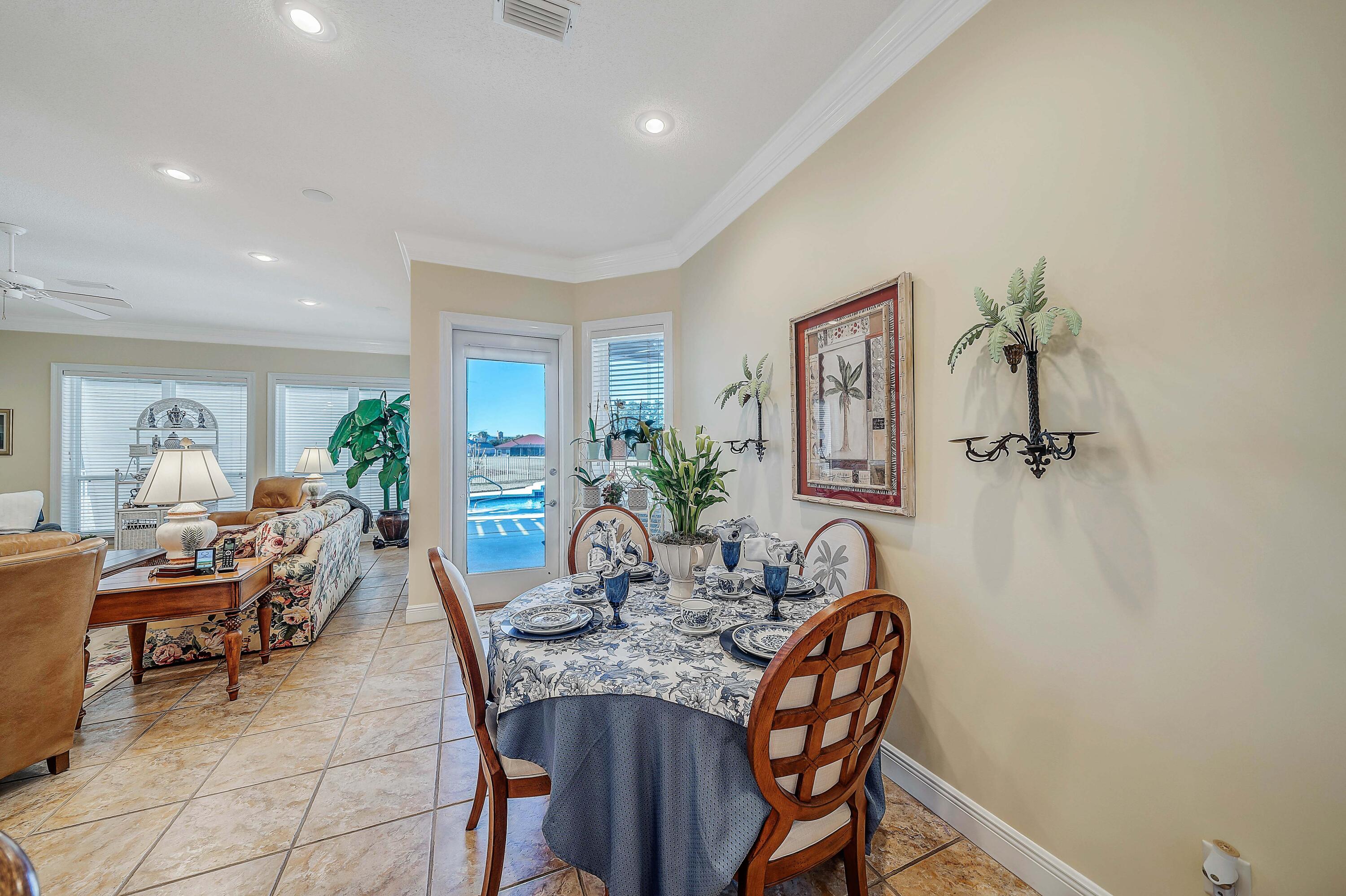 3601 Dragon's Ridge Road Panama City Beach, FL 32408 - Photo 19 of 62 a view of a dining room with furniture