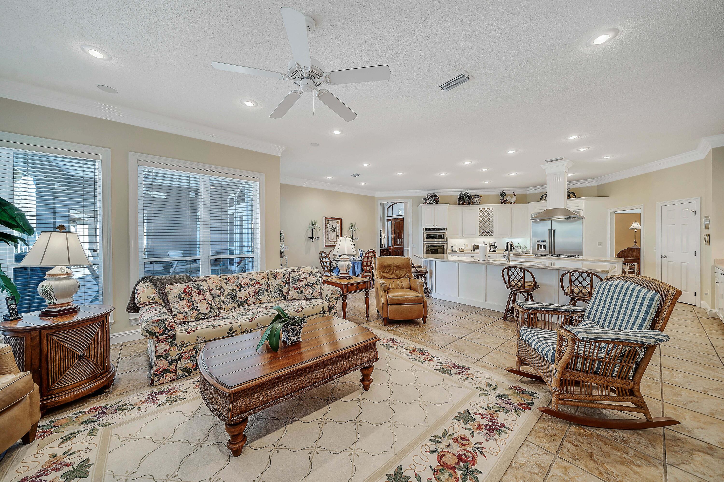 3601 Dragon's Ridge Road Panama City Beach, FL 32408 - Photo 23 of 62 a living room with furniture and a view of kitchen