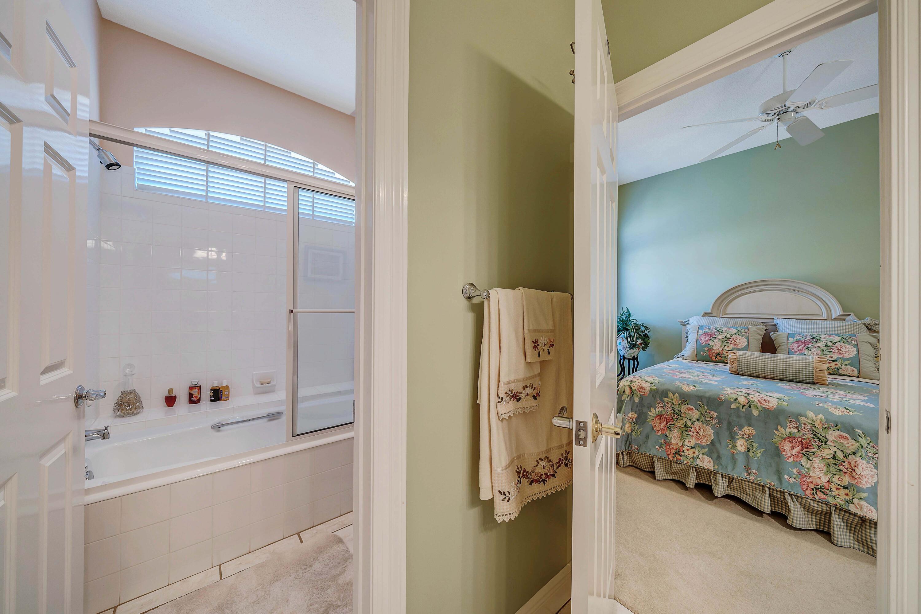 3601 Dragon's Ridge Road Panama City Beach, FL 32408 - Photo 32 of 62 a bedroom with a bed and a dresser