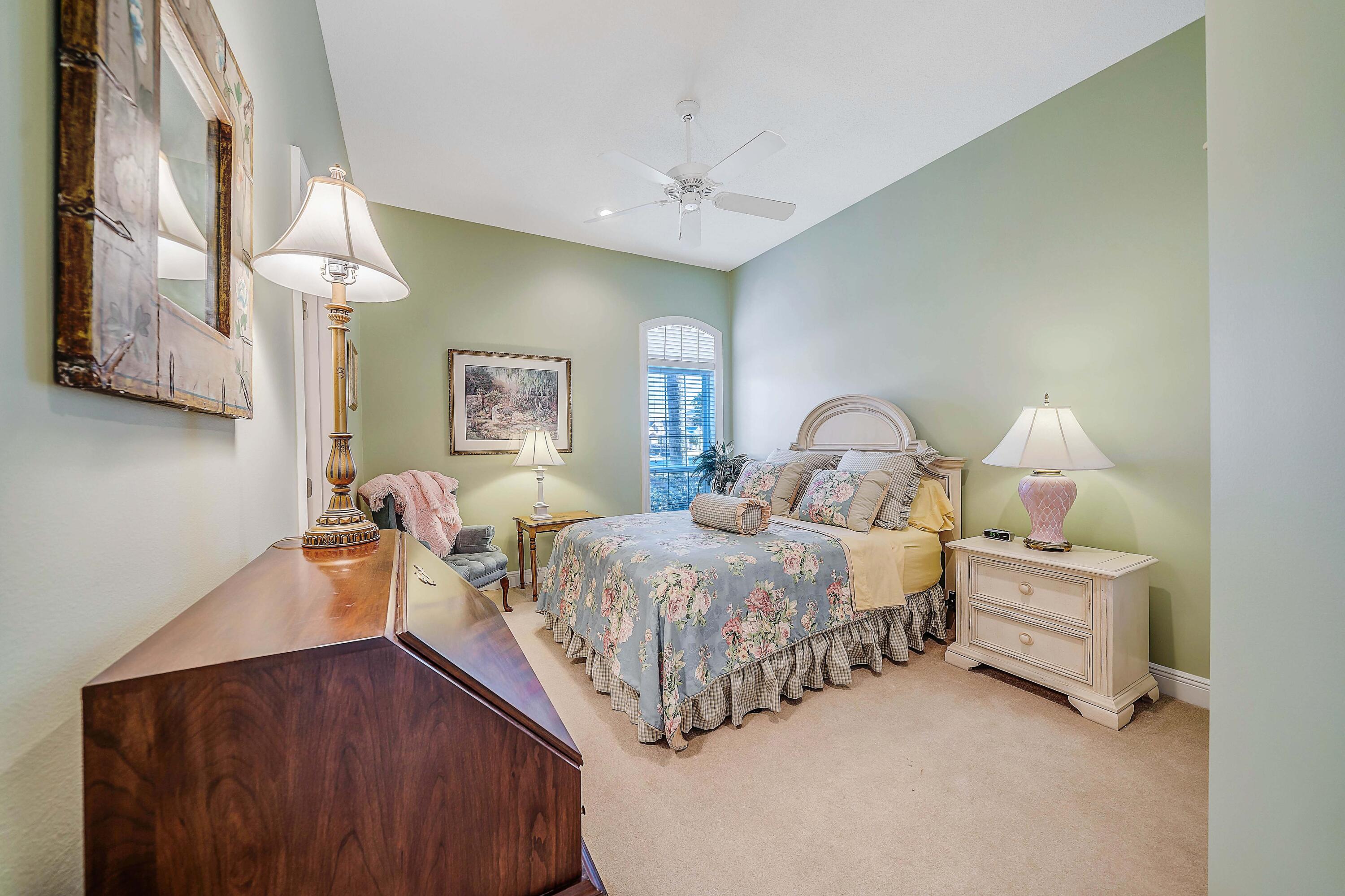 3601 Dragon's Ridge Road Panama City Beach, FL 32408 - Photo 35 of 62 a bed room with a bed and a lamp