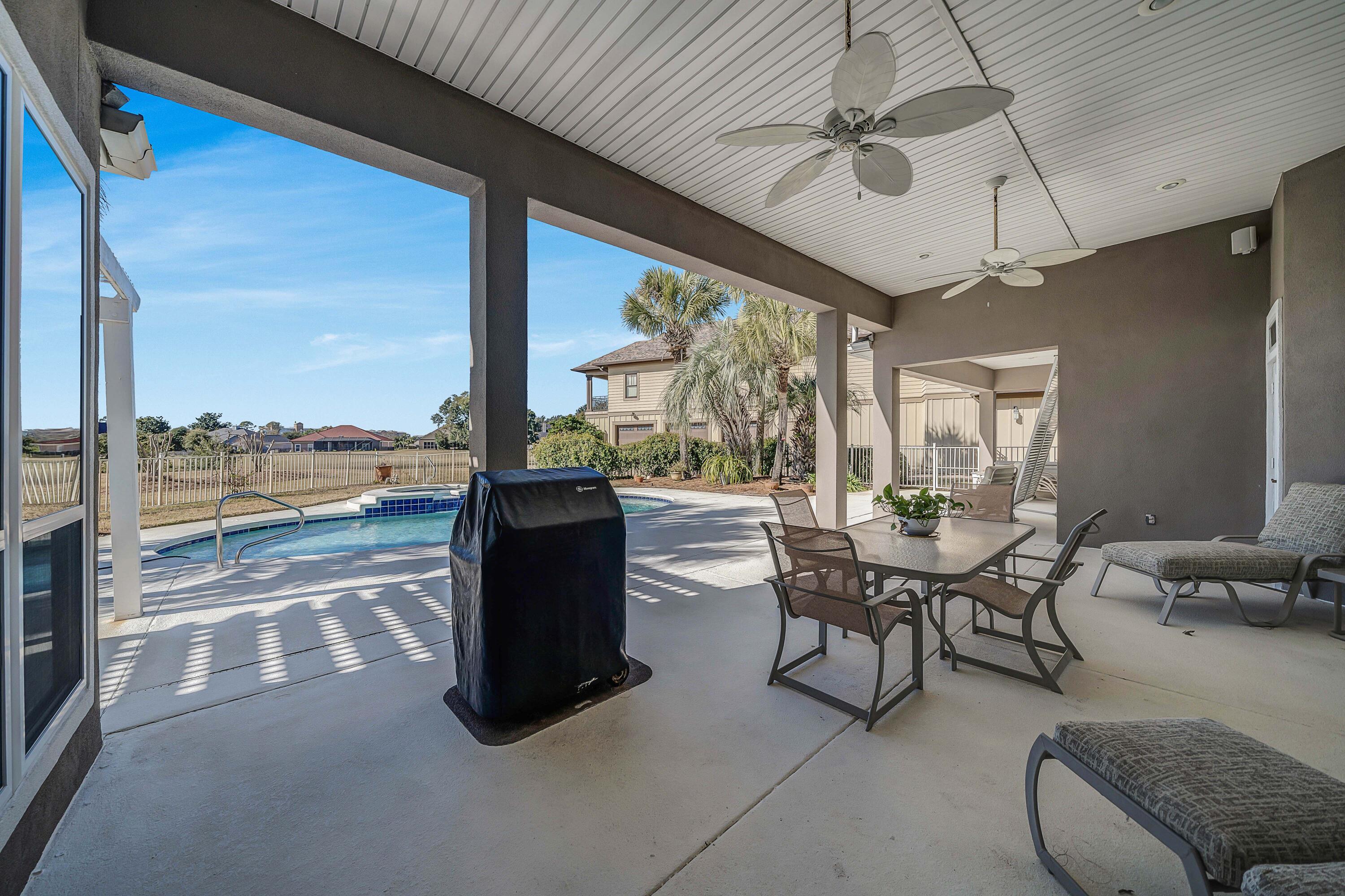 3601 Dragon's Ridge Road Panama City Beach, FL 32408 - Photo 42 of 62 a view of a dining room with furniture window and outside view