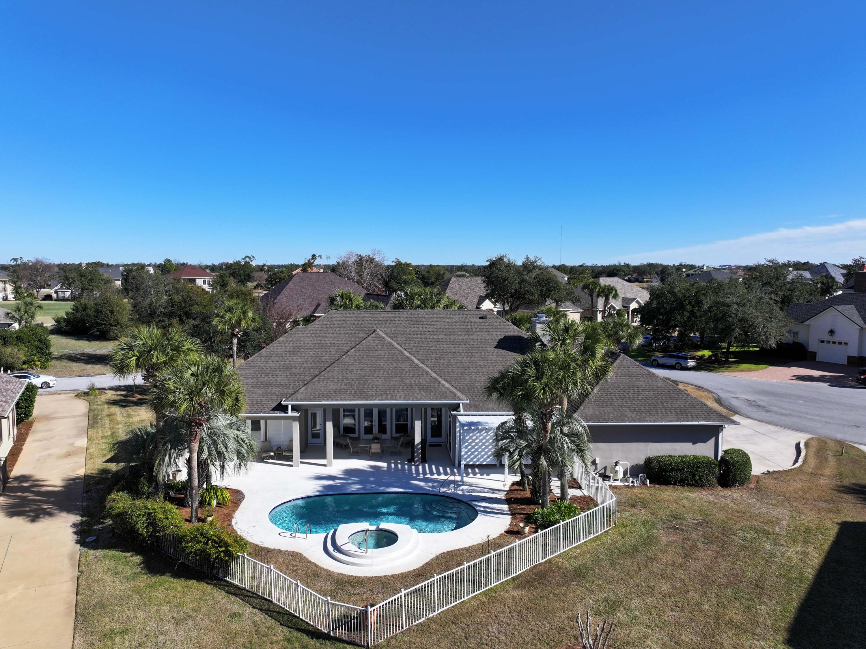 3601 Dragon's Ridge Road Panama City Beach, FL 32408 - Photo 44 of 62 an aerial view of a house with swimming pool and mountains