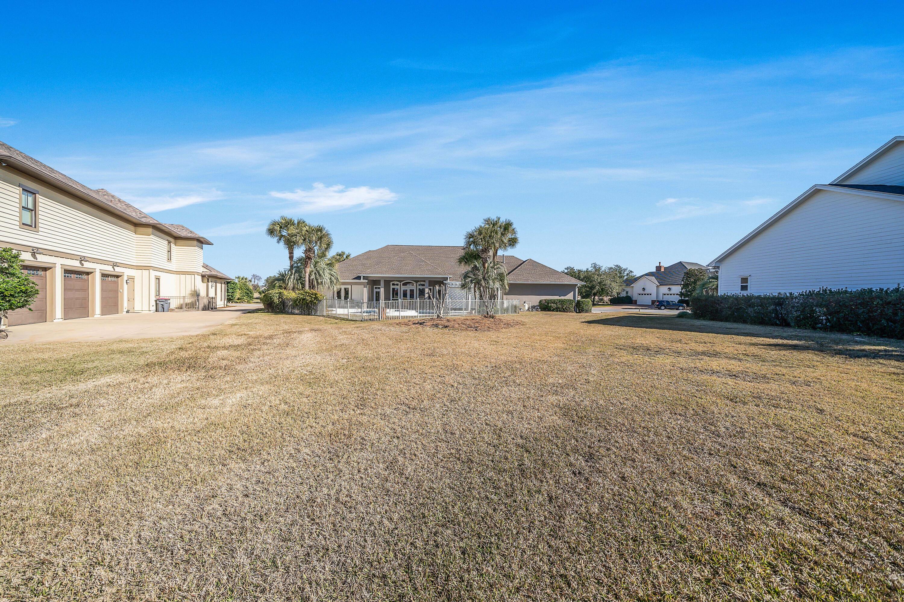 3601 Dragon's Ridge Road Panama City Beach, FL 32408 - Photo 48 of 62 a view of a house with a yard