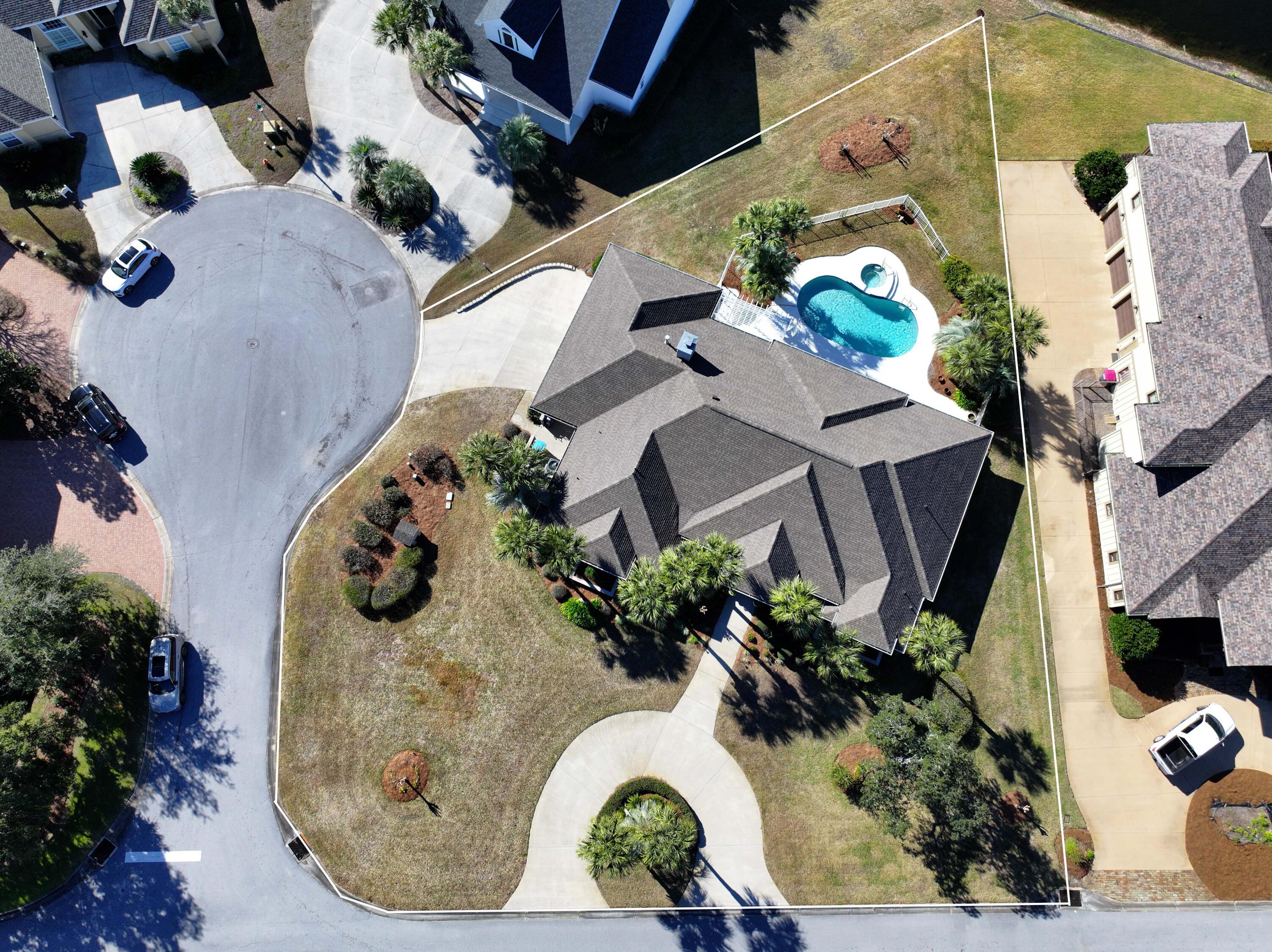 3601 Dragon's Ridge Road Panama City Beach, FL 32408 - Photo 56 of 62 an aerial view of a house with a swimming pool