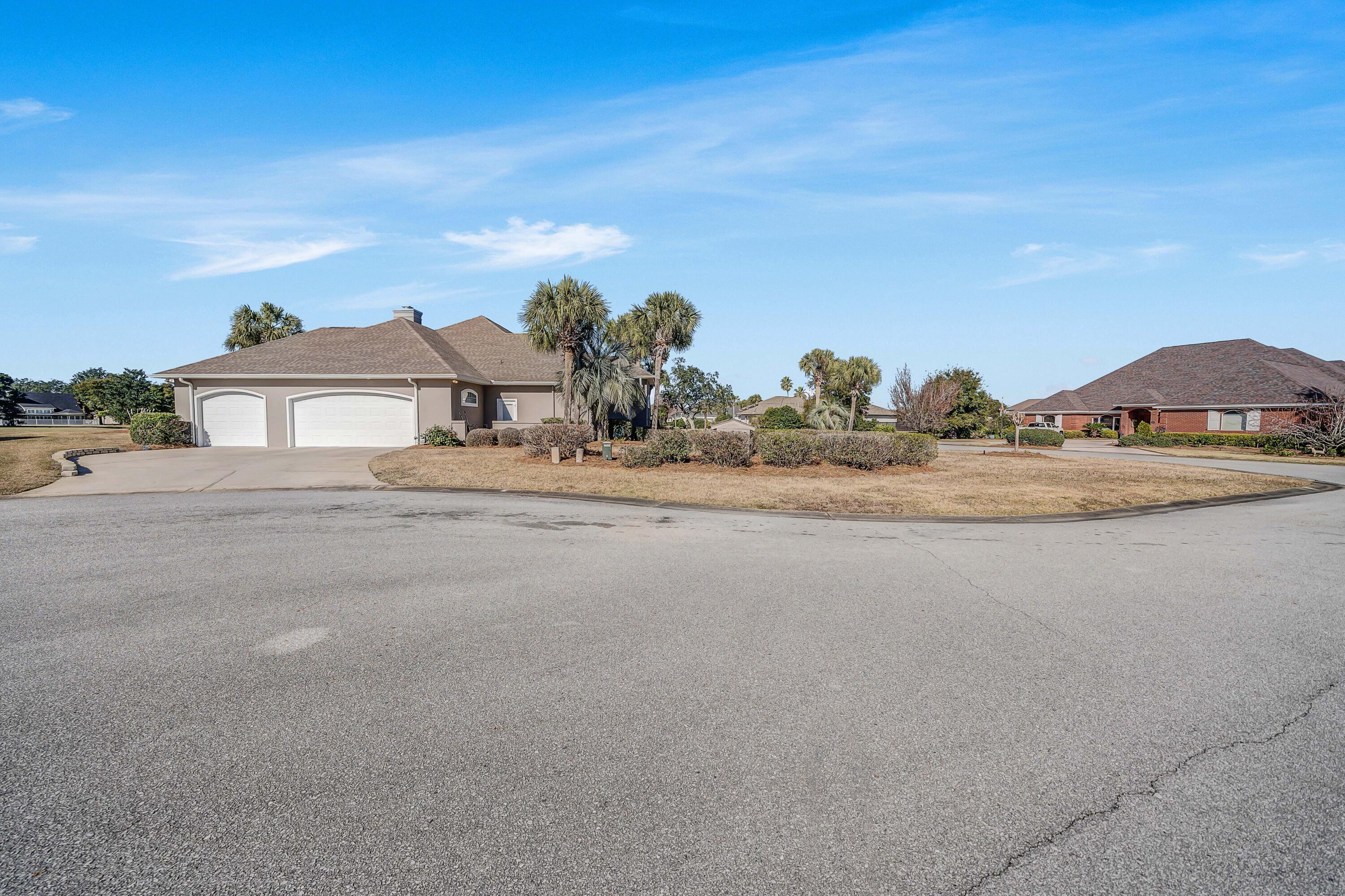 3601 Dragon's Ridge Road Panama City Beach, FL 32408 - Photo 61 of 62 front view of a house with a ocean view