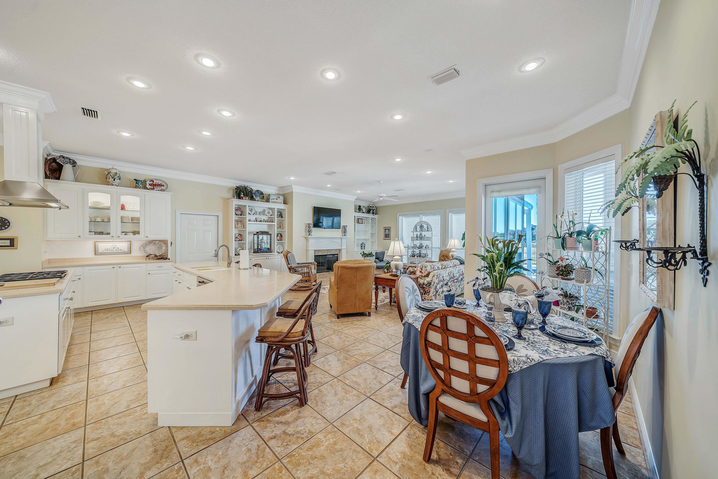3601 Dragon's Ridge Road Panama City Beach, FL 32408 - Photo 10 of 62 a large kitchen with a table and chairs