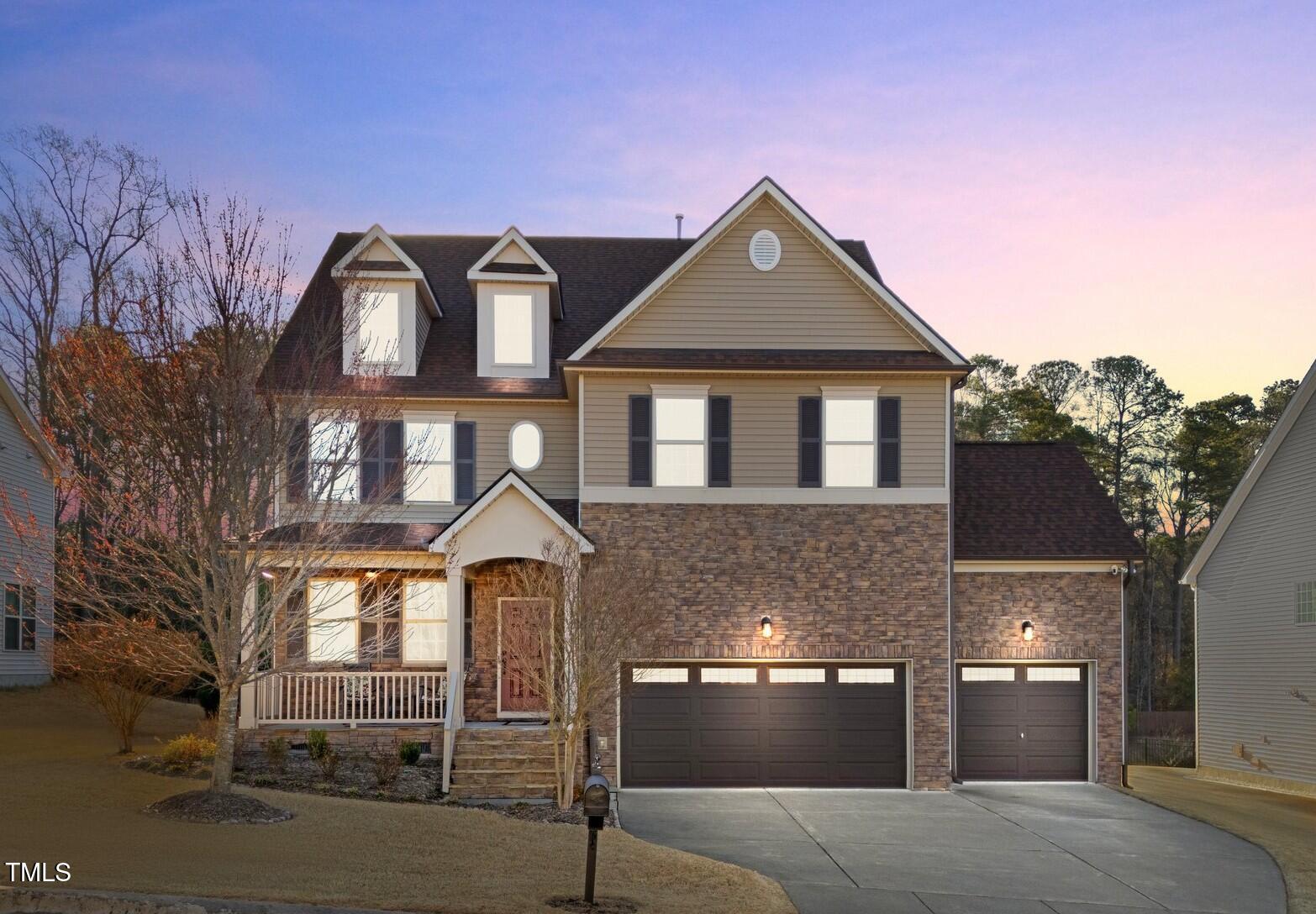 7520 Channery Way Raleigh, NC 27616 - Photo 1 of 47 a front view of a house with a yard