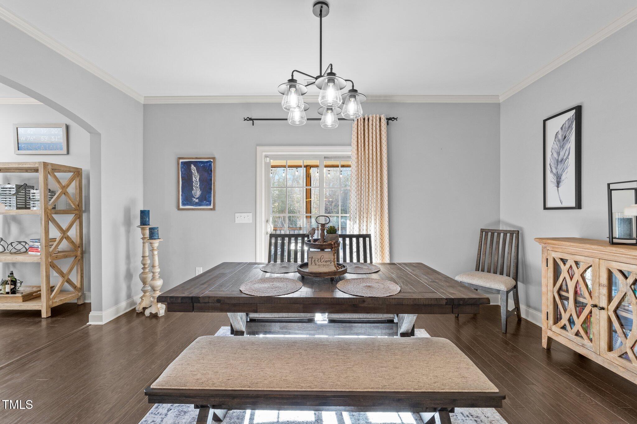 7520 Channery Way Raleigh, NC 27616 - Photo 14 of 47 a dining room with wooden floor and window