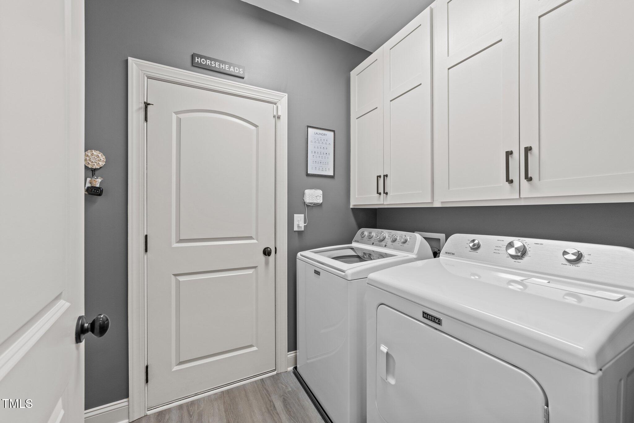 7520 Channery Way Raleigh, NC 27616 - Photo 20 of 47 a utility room with dryer and washer