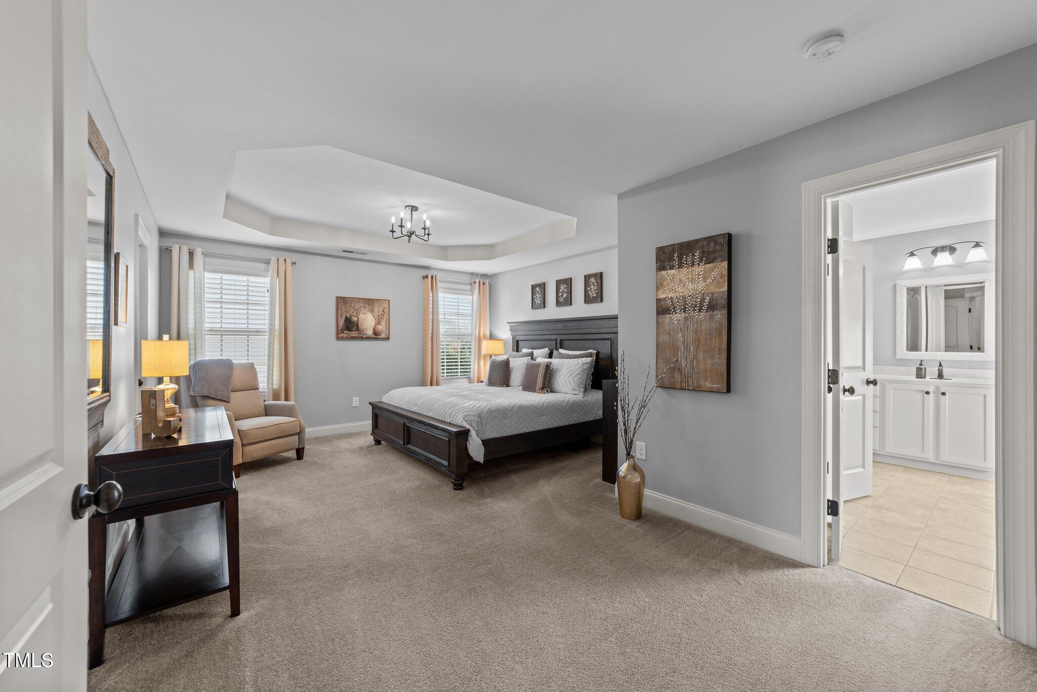 7520 Channery Way Raleigh, NC 27616 - Photo 22 of 47 a bedroom with furniture and a window