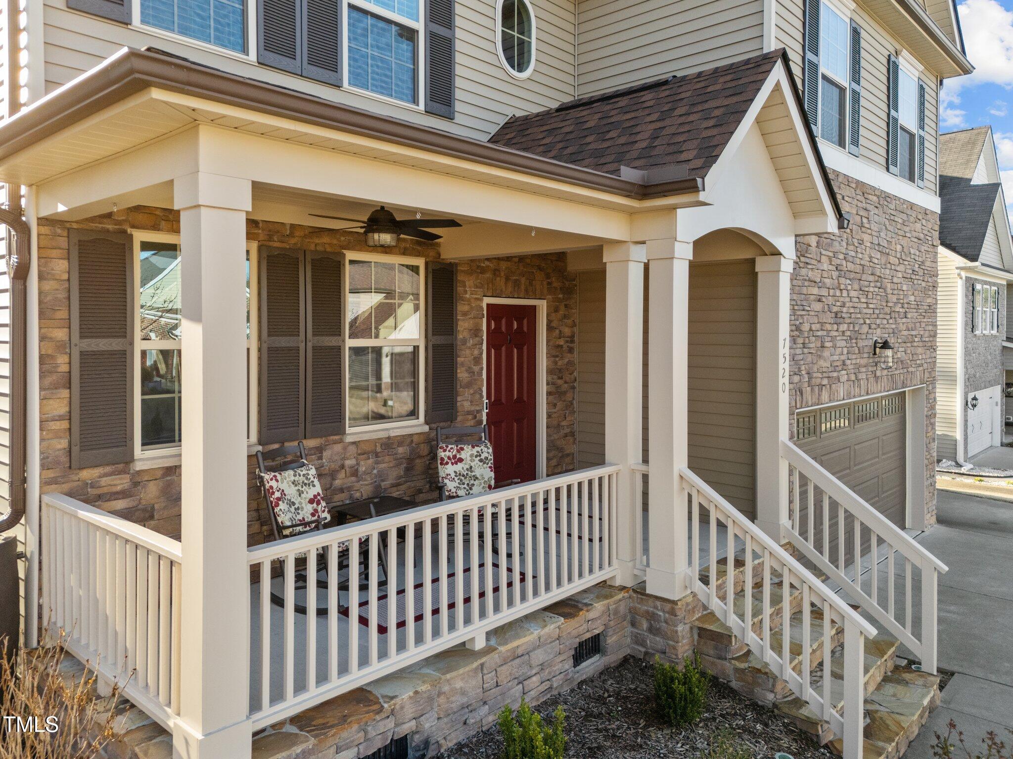 7520 Channery Way Raleigh, NC 27616 - Photo 2 of 47 a view of a brick house with large windows