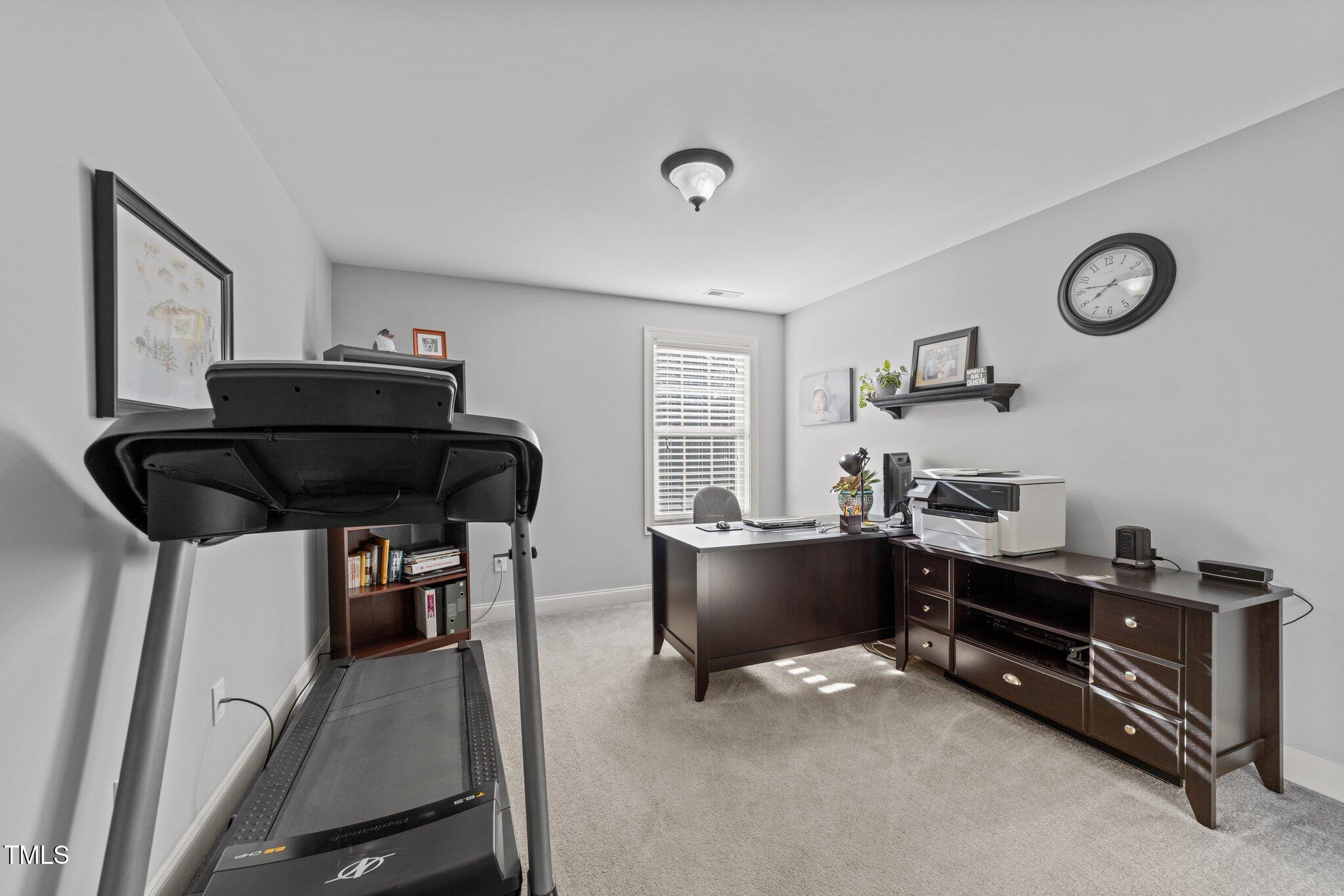 7520 Channery Way Raleigh, NC 27616 - Photo 36 of 47 a room with furniture and window