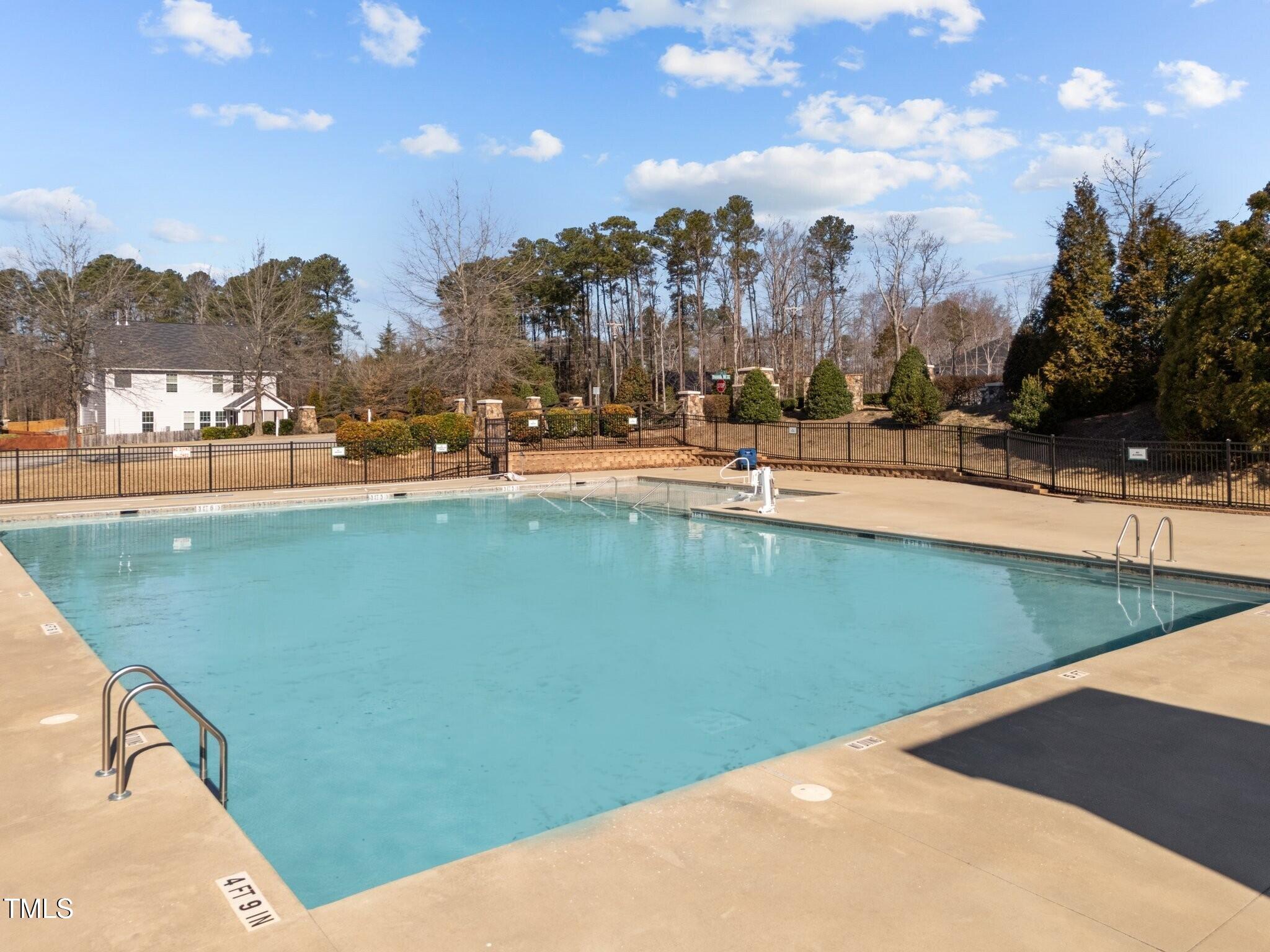 7520 Channery Way Raleigh, NC 27616 - Photo 45 of 47 a view of a swimming pool and an outdoor seating