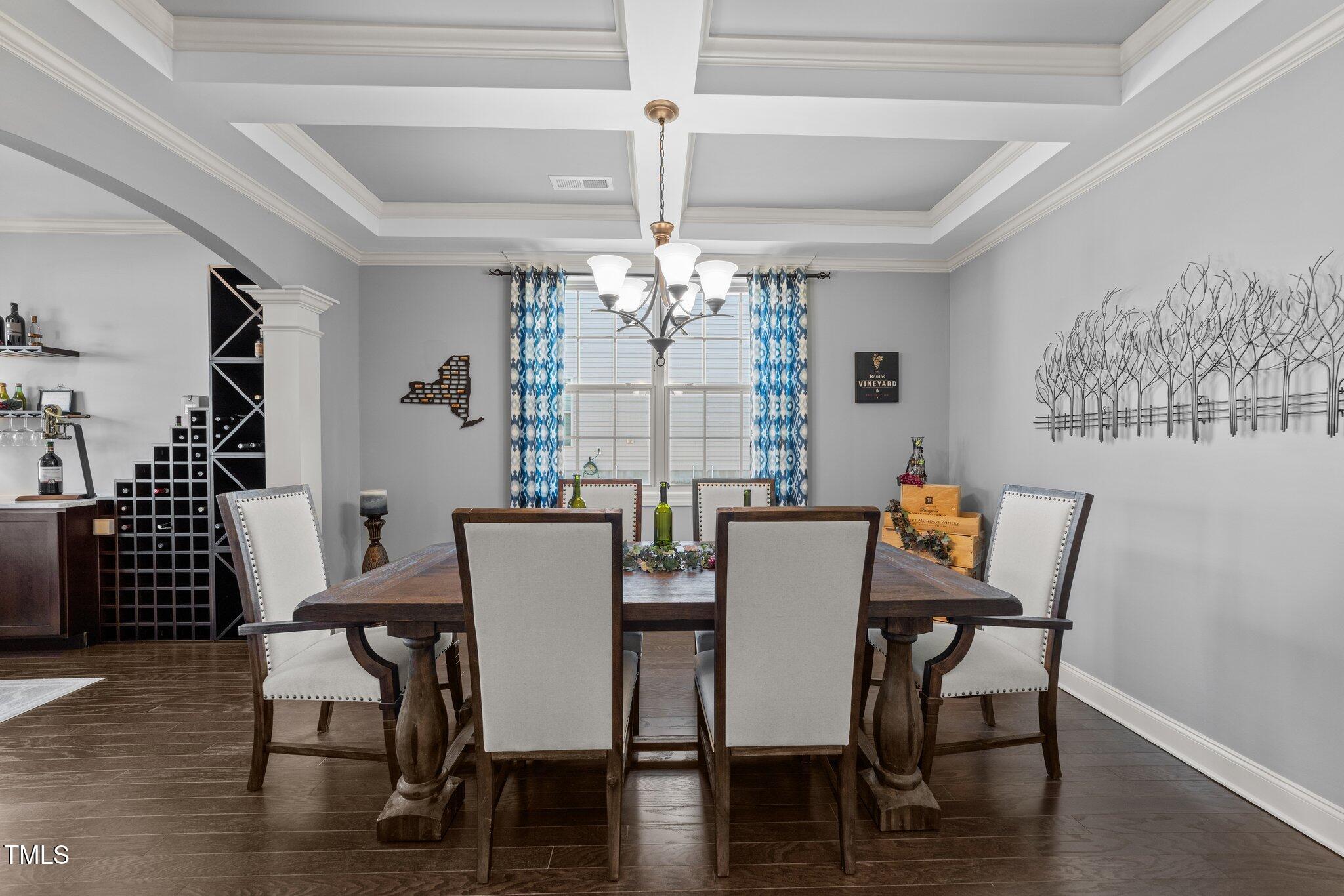 7520 Channery Way Raleigh, NC 27616 - Photo 8 of 47 a view of a dining room with furniture window and wooden floor