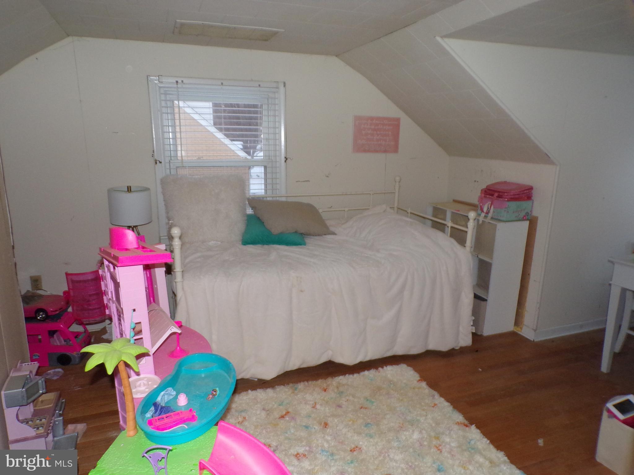 3316 Stoudts Ferry Bridge Road Reading, PA 19605 - Photo 12 of 18 a bedroom with a bed toys and a potted plant