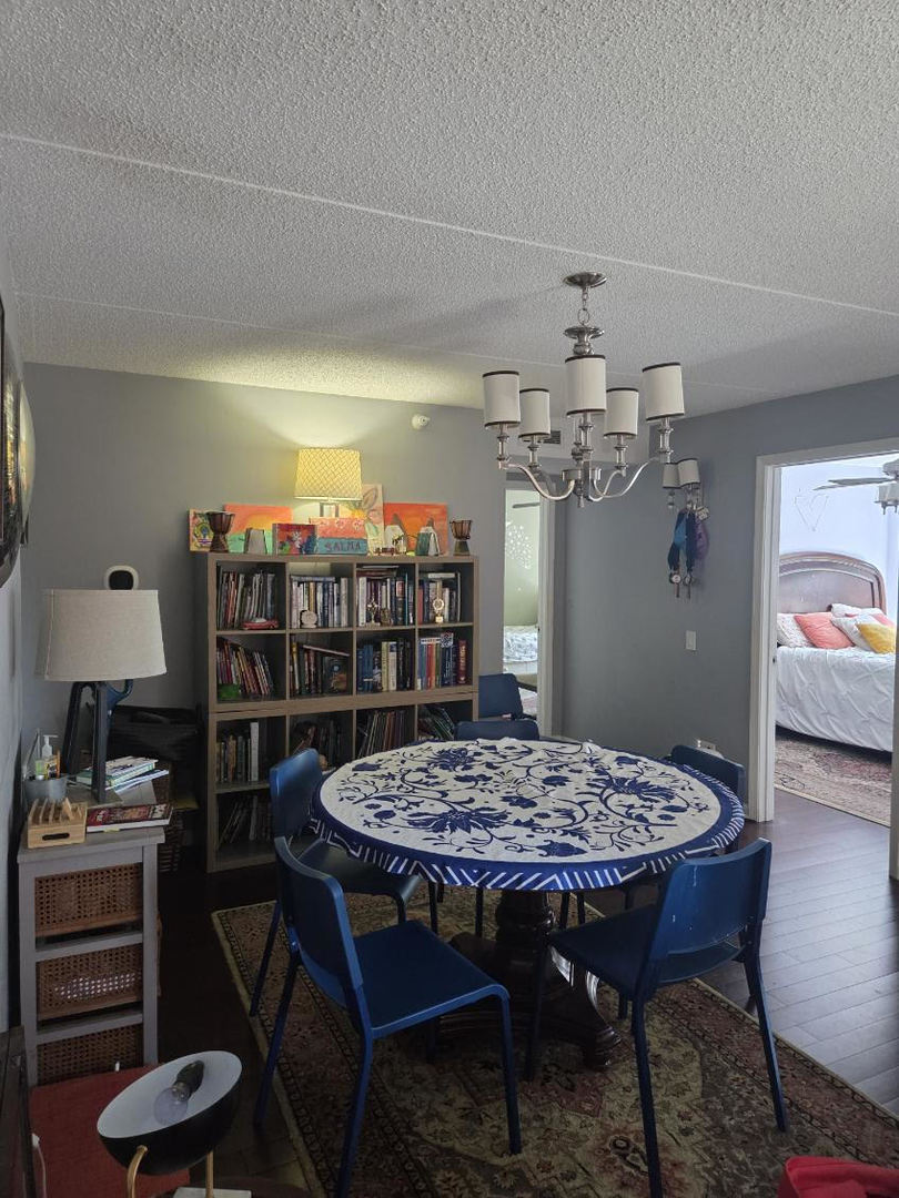811 Chicago Avenue, Unit 308 Evanston, IL 60202 - Photo 8 of 18 a view of a dining room with furniture