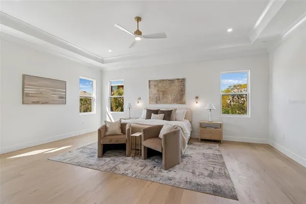 a spacious bathroom with a double vanity sink and a mirror