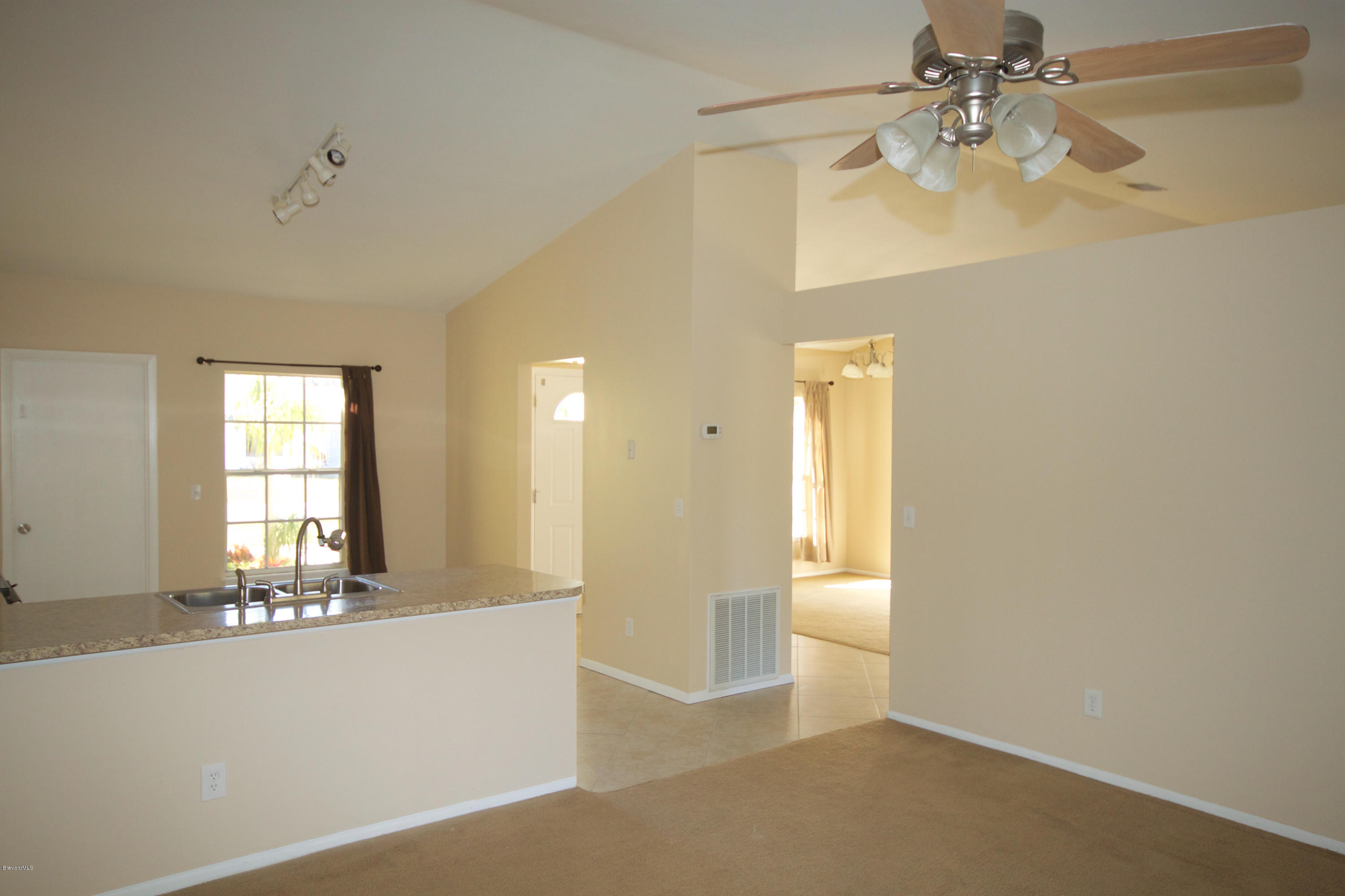 6469 Hudson Road Cocoa, FL 32927 - Photo 3 of 10 Kitchen/Family room 2