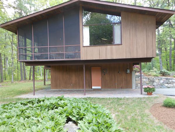 30 Sedgemeadow Road Wayland, MA 01778 - Photo 27 of 30 a front view of a house with a garden