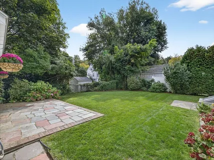 a view of a backyard with a garden