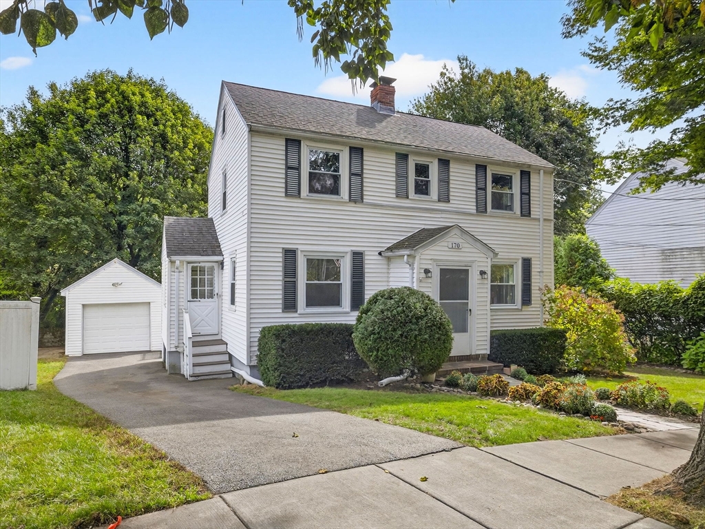 170 Payson Road Boston, MA 02467 - Photo 2 of 20 a front view of a house with garden