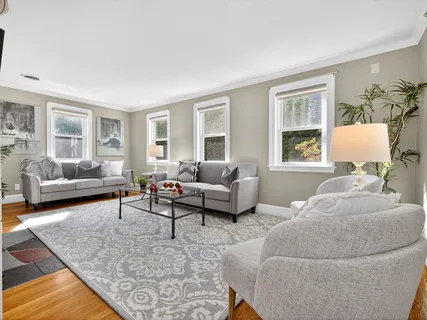 a living room with furniture and a couch