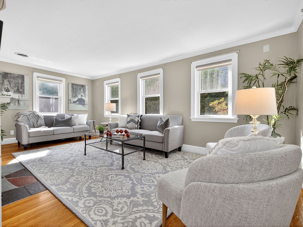 170 Payson Road Boston, MA 02467 - Photo 3 of 20 a living room with furniture and a couch