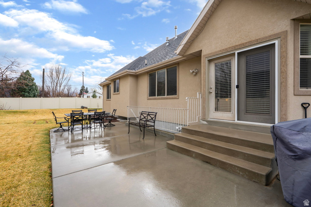 557 South 1470th Street East Springville, UT 84663 - Photo 39 of 46 View of patio / terrace featuring outdoor dining area and entry steps