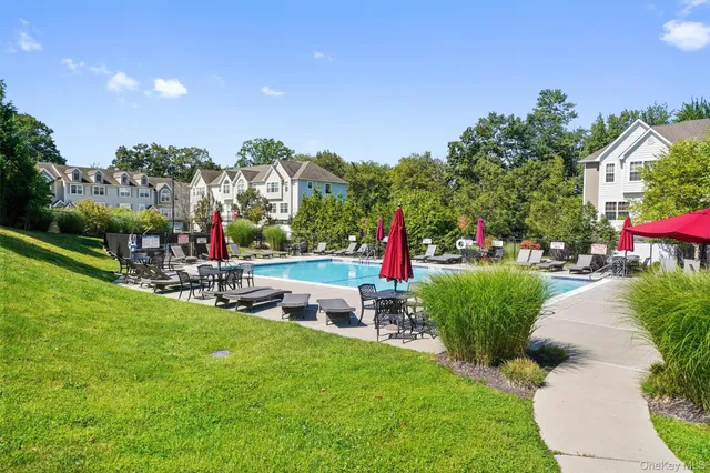 a view of a room with entertaining space and a tree
