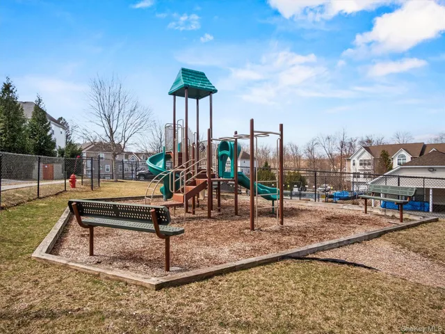a swimming pool with outdoor seating