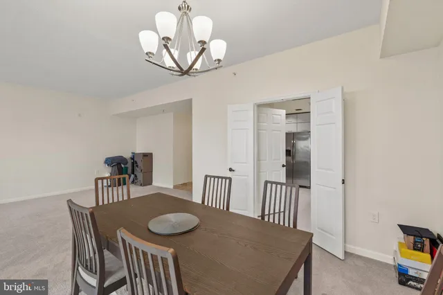 a kitchen with a sink stove and refrigerator