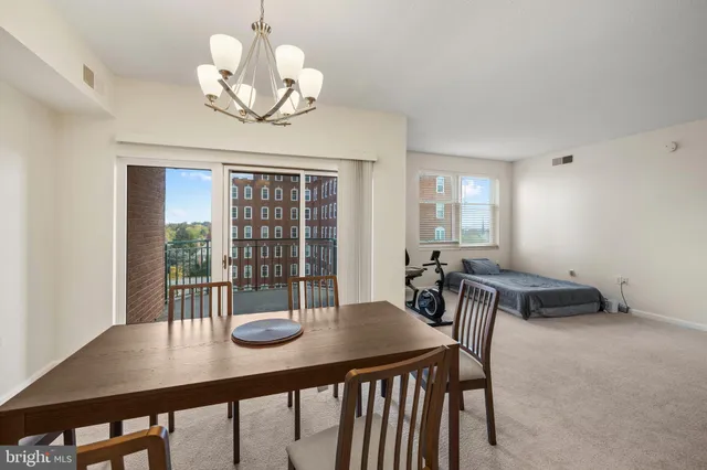 a kitchen with a sink a stove and cabinets