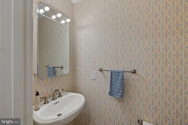 a bathroom with a bathtub and a toilet
