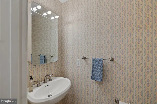 a bathroom with a bathtub and a toilet