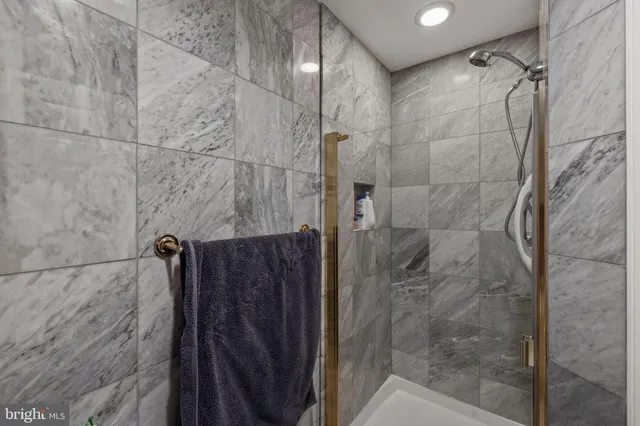 a bedroom with a bed and a cabinets