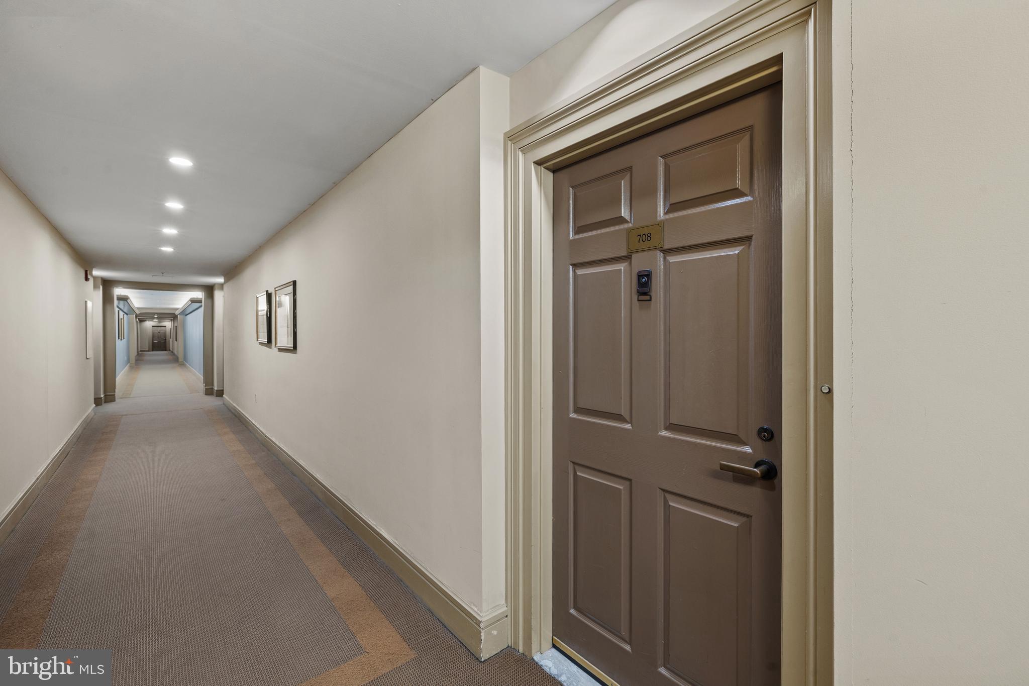3801 Canterbury Road, Unit 708 Baltimore, MD 21218 - Photo 6 of 22 a view of hallway with stairs