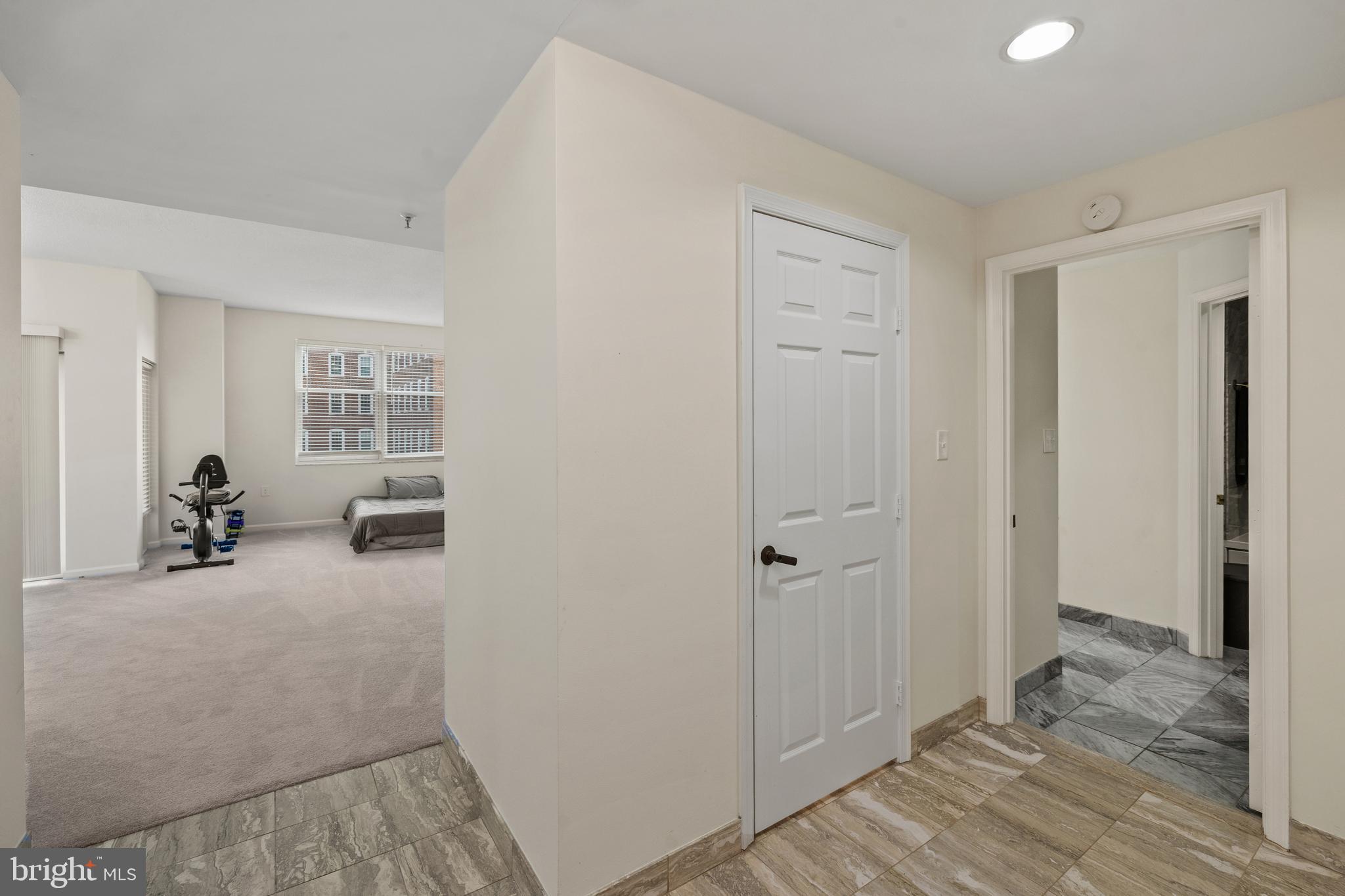 3801 Canterbury Road, Unit 708 Baltimore, MD 21218 - Photo 7 of 22 a view of a room with closet area