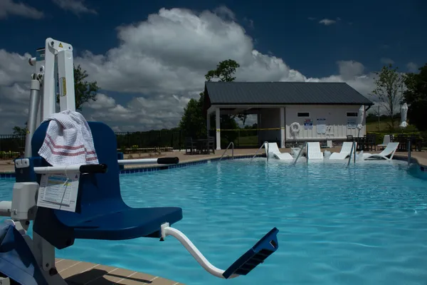 a view of swimming pool with seating area