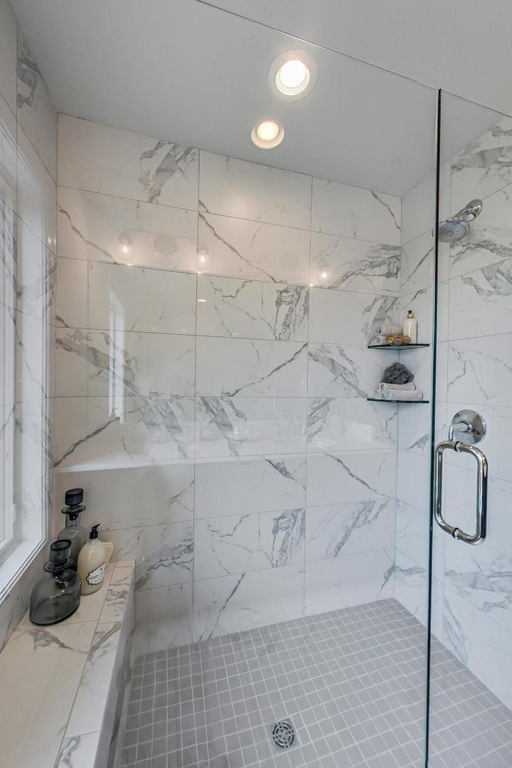 1261 Shermer Road Northbrook, IL 60062 - Photo 18 of 33 a bathroom with a shower