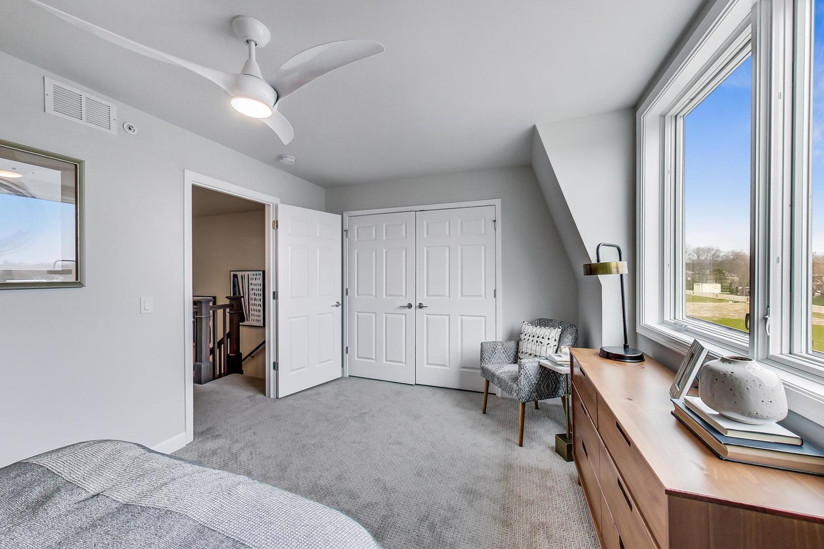 1261 Shermer Road Northbrook, IL 60062 - Photo 21 of 33 a living room with furniture and a window