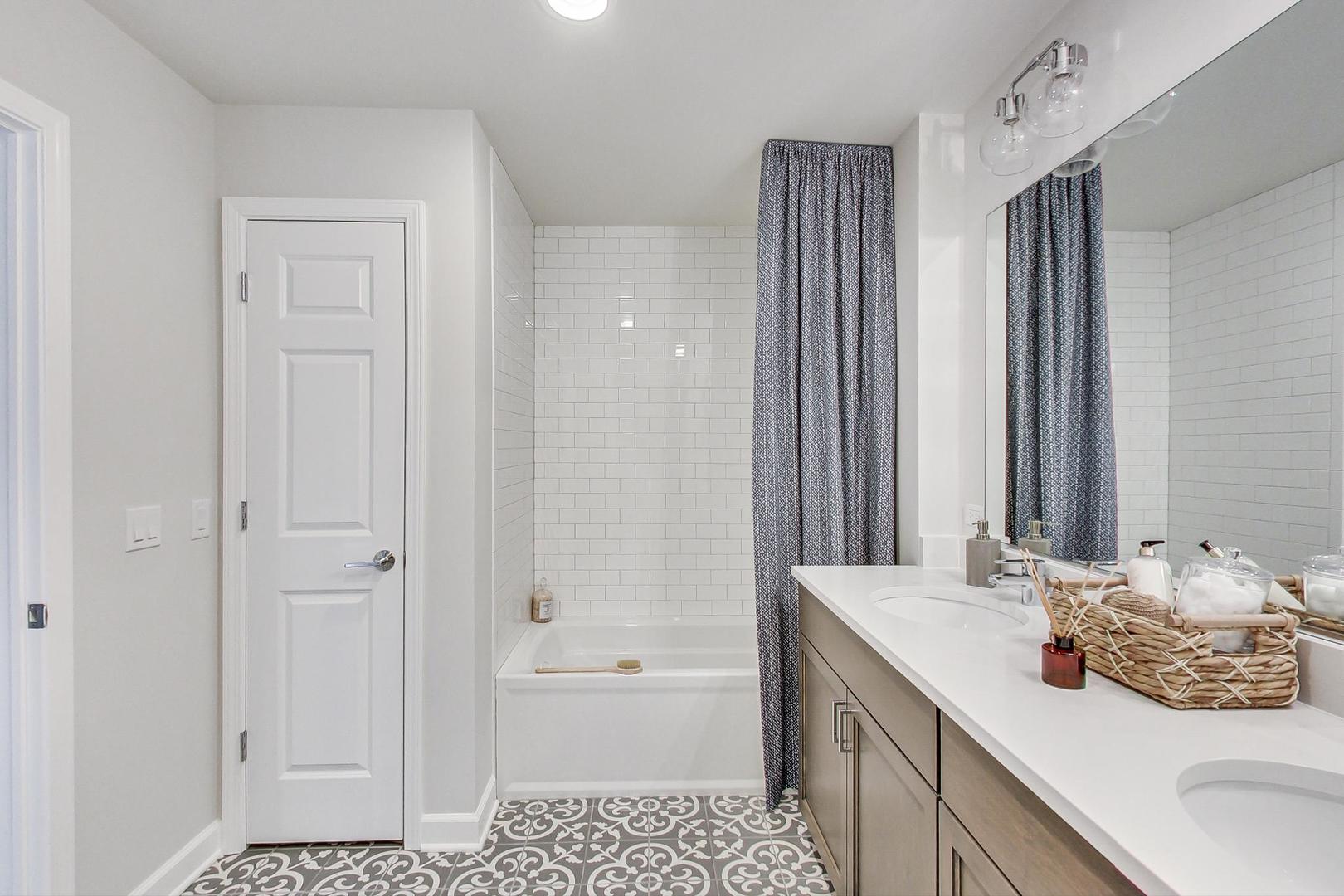 1261 Shermer Road Northbrook, IL 60062 - Photo 23 of 33 a bathroom with a granite countertop sink a toilet and shower