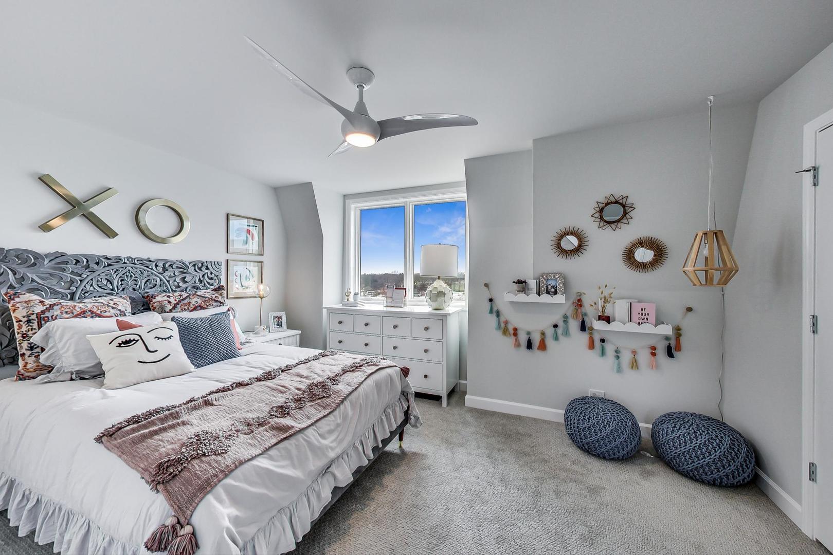 1261 Shermer Road Northbrook, IL 60062 - Photo 24 of 33 a bedroom with a bed and ceiling fan