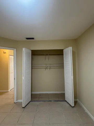 an empty room with closet