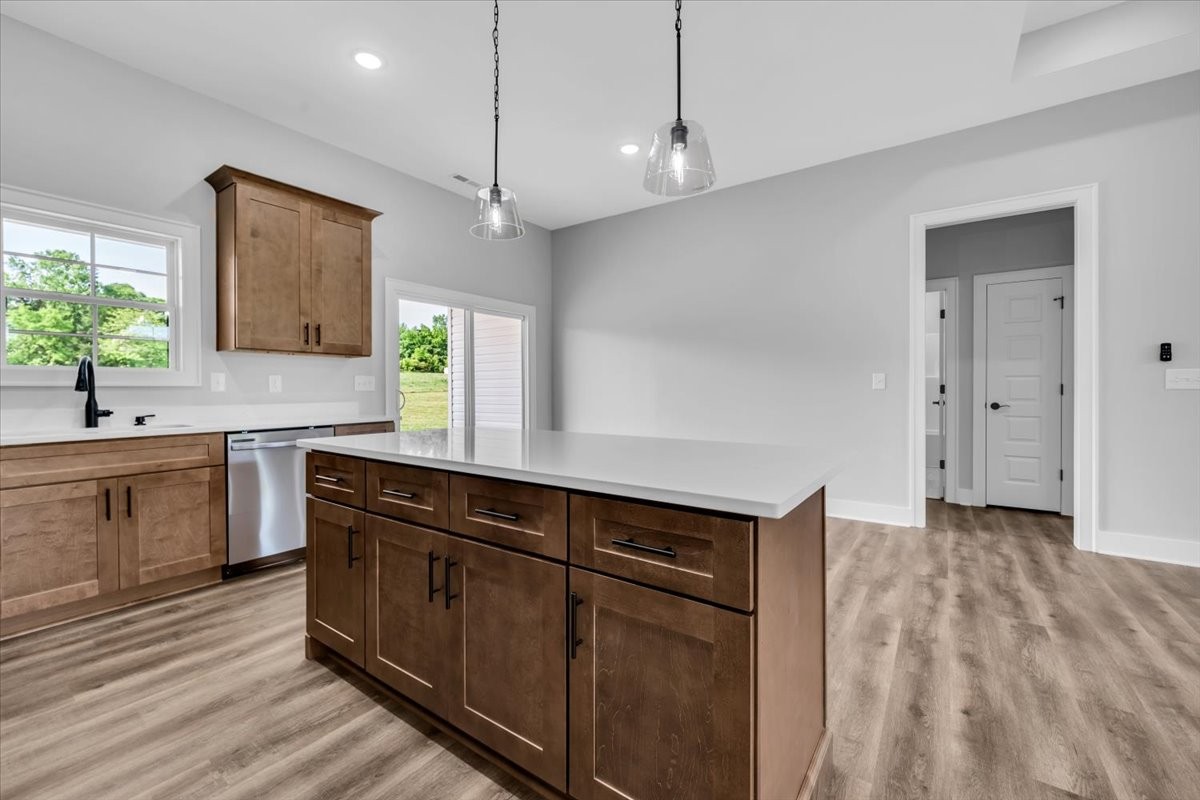 749 Edd Ramsey Road McMinnville, TN 37110 - Photo 13 of 40 a kitchen with a sink cabinets and wooden floor