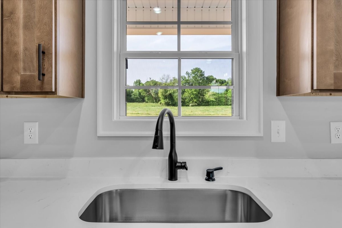 749 Edd Ramsey Road McMinnville, TN 37110 - Photo 16 of 40 a bathroom with a sink and a window