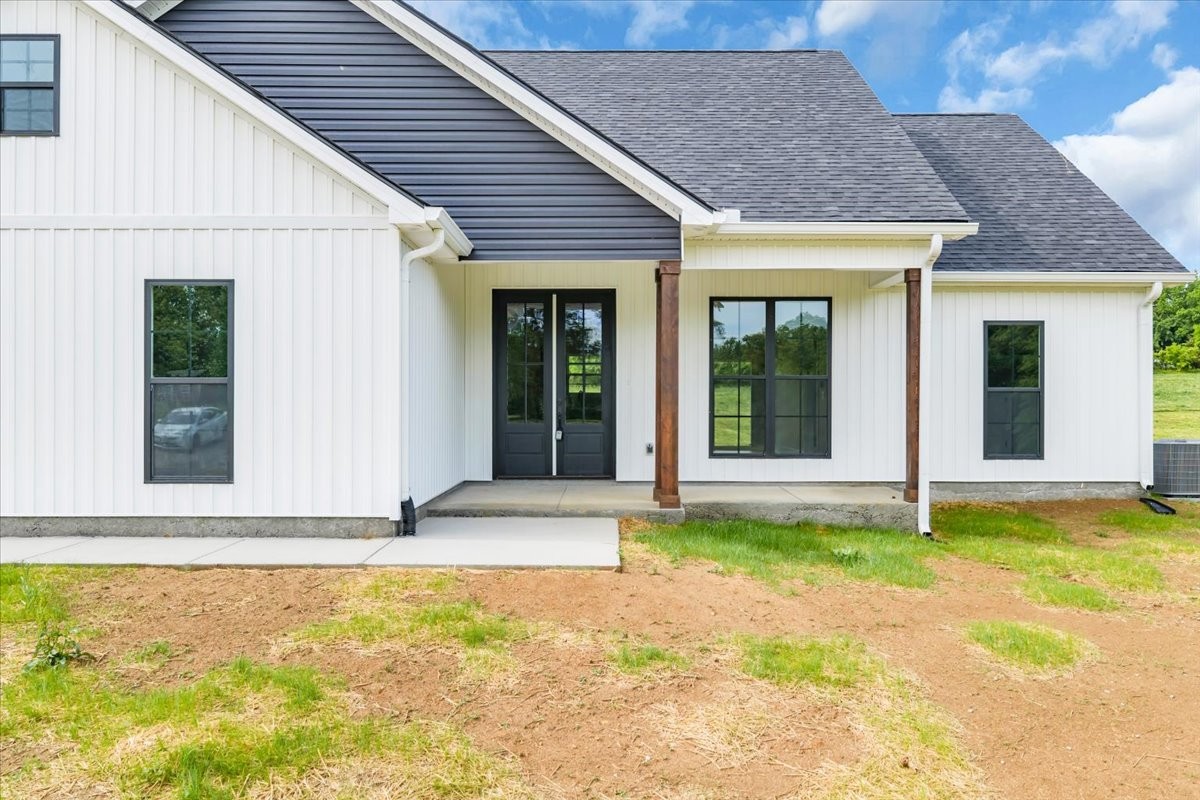 749 Edd Ramsey Road McMinnville, TN 37110 - Photo 3 of 40 a view of yellow house with two windows
