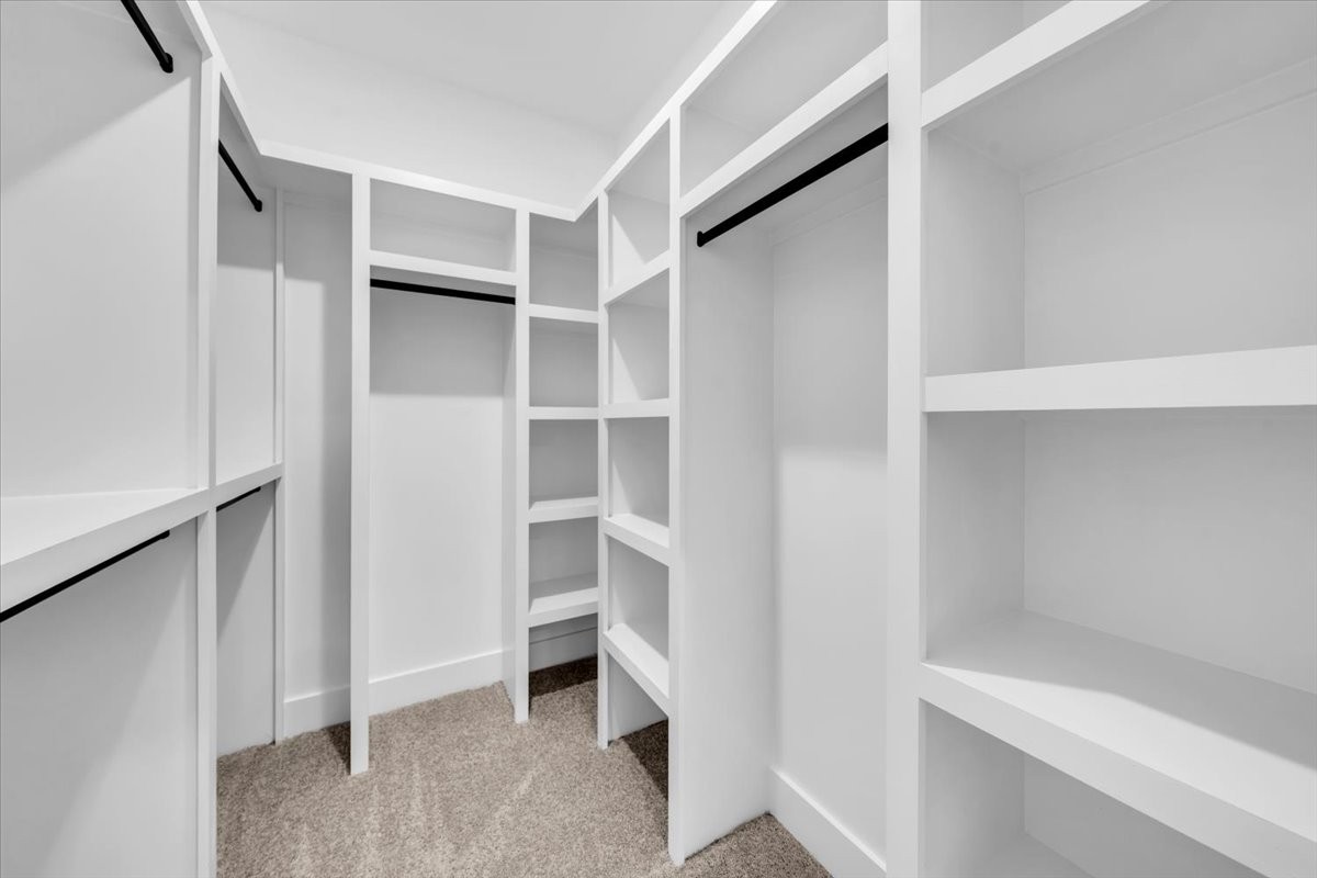 749 Edd Ramsey Road McMinnville, TN 37110 - Photo 31 of 40 a view of walk in closet with empty racks