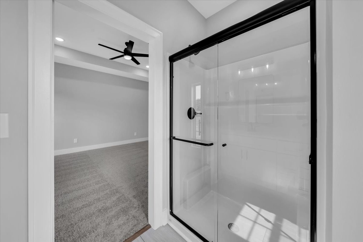 749 Edd Ramsey Road McMinnville, TN 37110 - Photo 34 of 40 a bathroom with a glass shower door