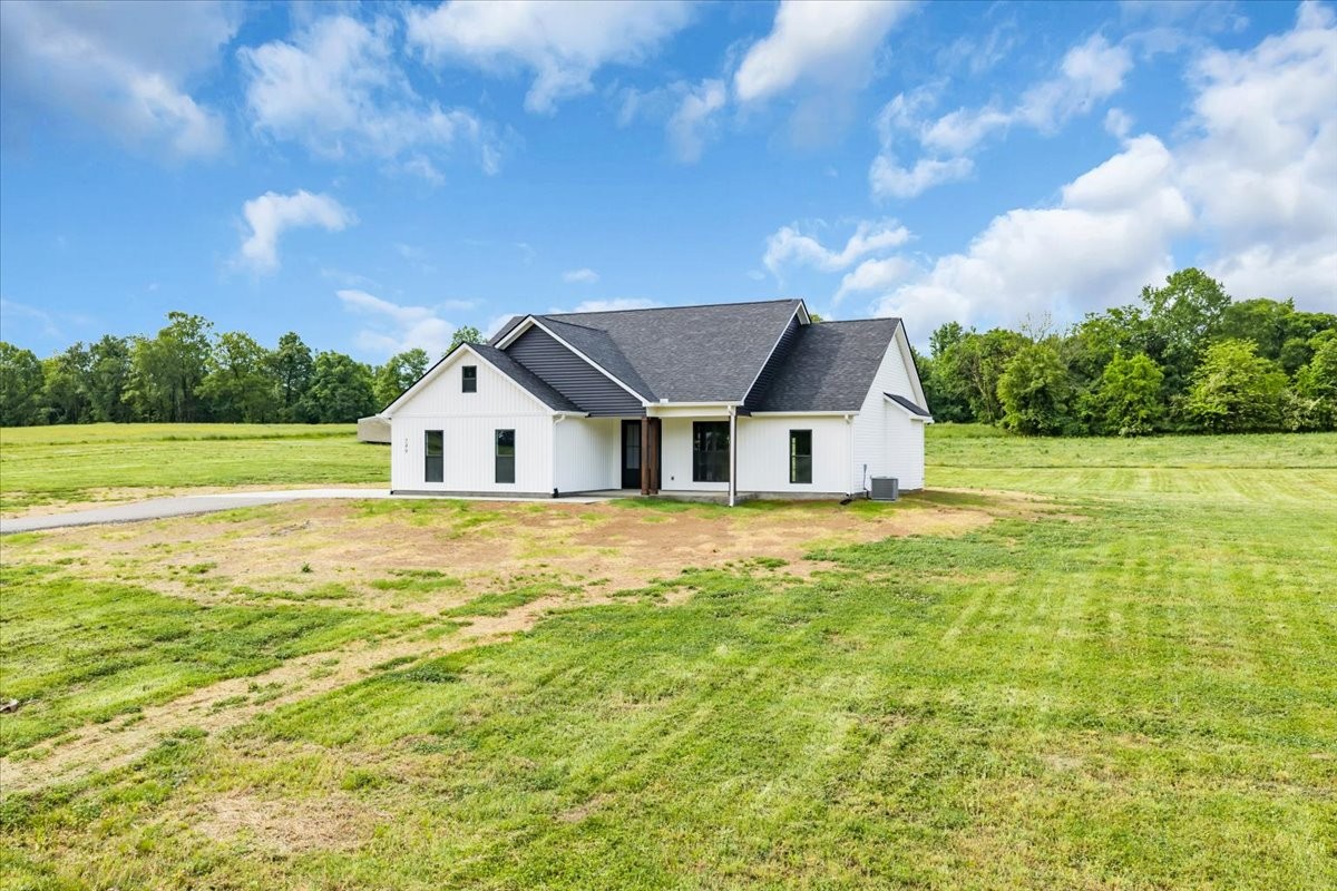 749 Edd Ramsey Road McMinnville, TN 37110 - Photo 36 of 40 a house with pool in front of it